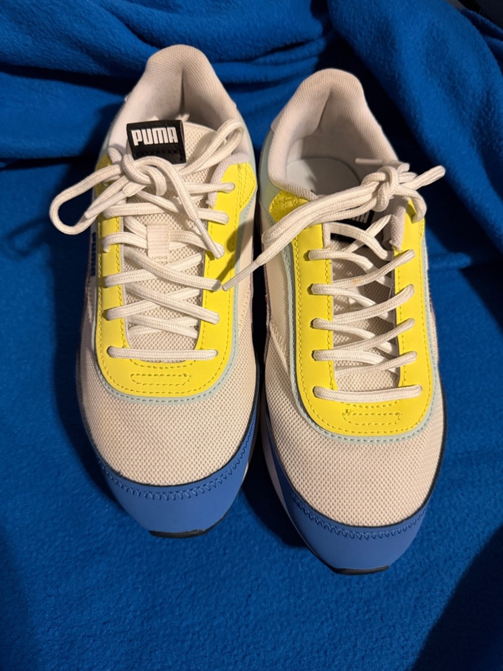 Puma White Sneakers with Yellow Panels and Blue Toe